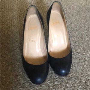 Designer Navy pumps
